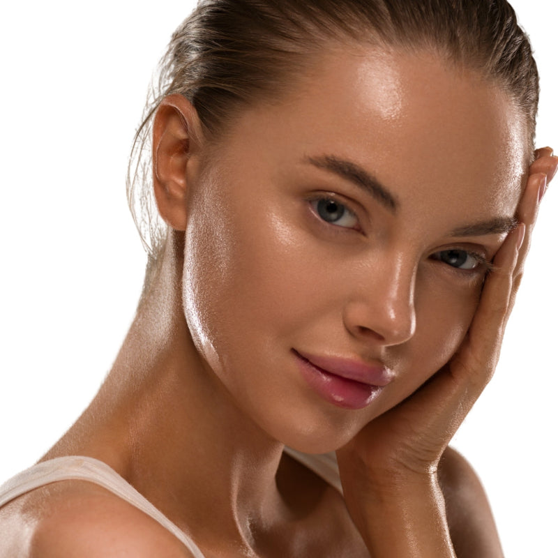 Close-up of a woman with a neutral expression on a white background
